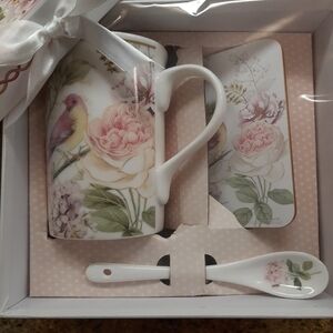 NIB MUG, COASTER AND SPOON SET.